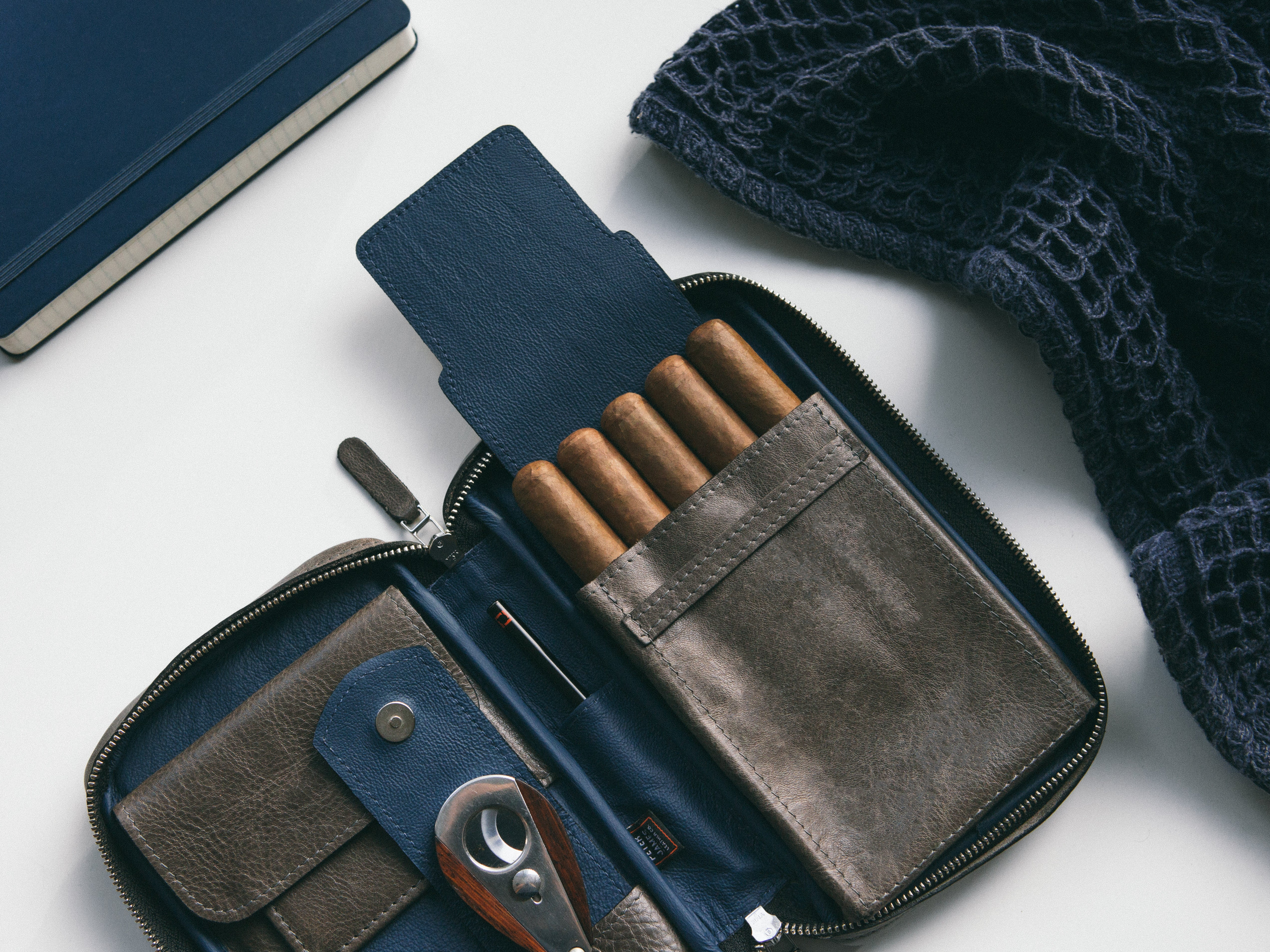 THIS LEATHER CIGAR TOTE IS A MURSE WE CAN GET BEHIND