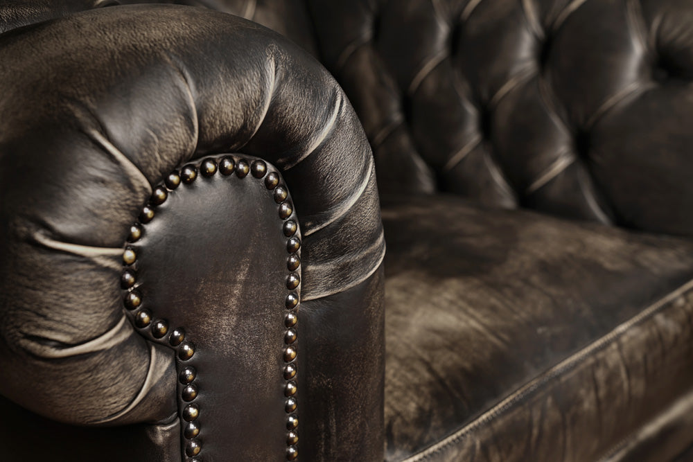 The Henry Lounge Chair Peter James Co Brown leather chair